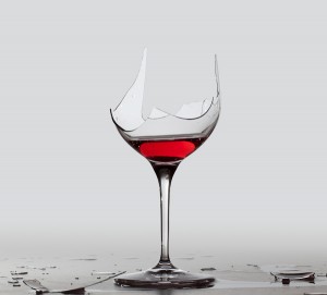 Wine glass broken into jagged pieces