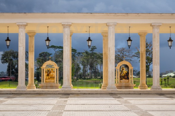 Stations of the Cross against stormy sky