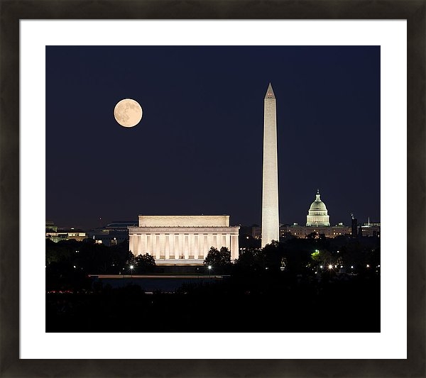 Latest sale on Fine Art America - the moon rising over the three monuments on the Mall in Washington DC