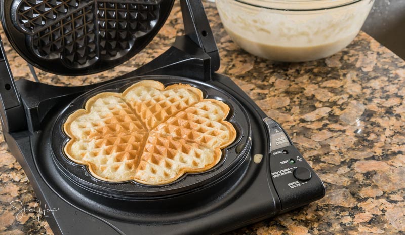 Norwegian heart shaped waffle maker on granite kitchen worktop