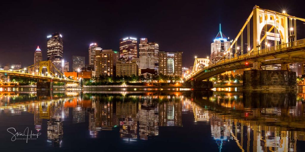 Stock photo of the night skyline of Pittsburgh Pennsylvania from the river trail