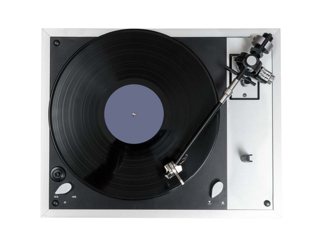 Stock photo of a LP record on a record player or turntable
