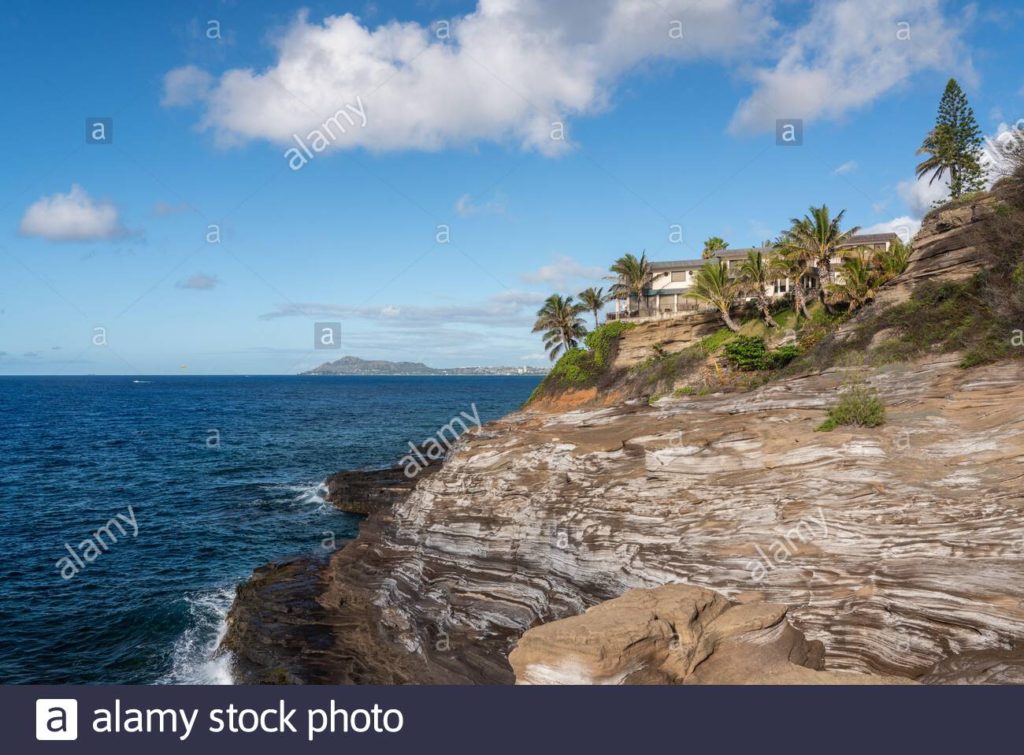 Stock photo of expensive homes on the cliffs above the ocean near Diamond Head on Oahu in Hawaii