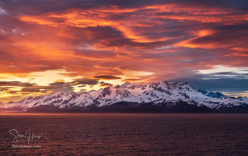 Late evening sunset on panorama of mountains and Mount Fairweather by Glacier Bay National Park in Alaska