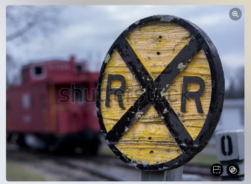 Old railroad sign by train wagon