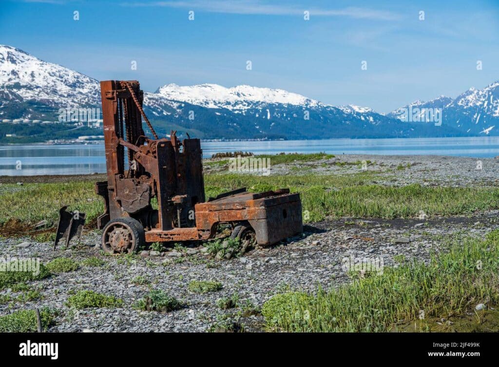 Abandoned dock machinery on the remains of the old town in Alaska