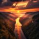 a sunset over the New River Gorge bridge in West Virginia