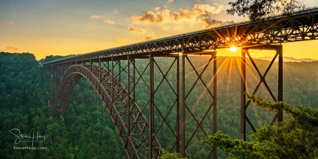 New River Gorge sunset print sold as a panoramic metal print on Etsy