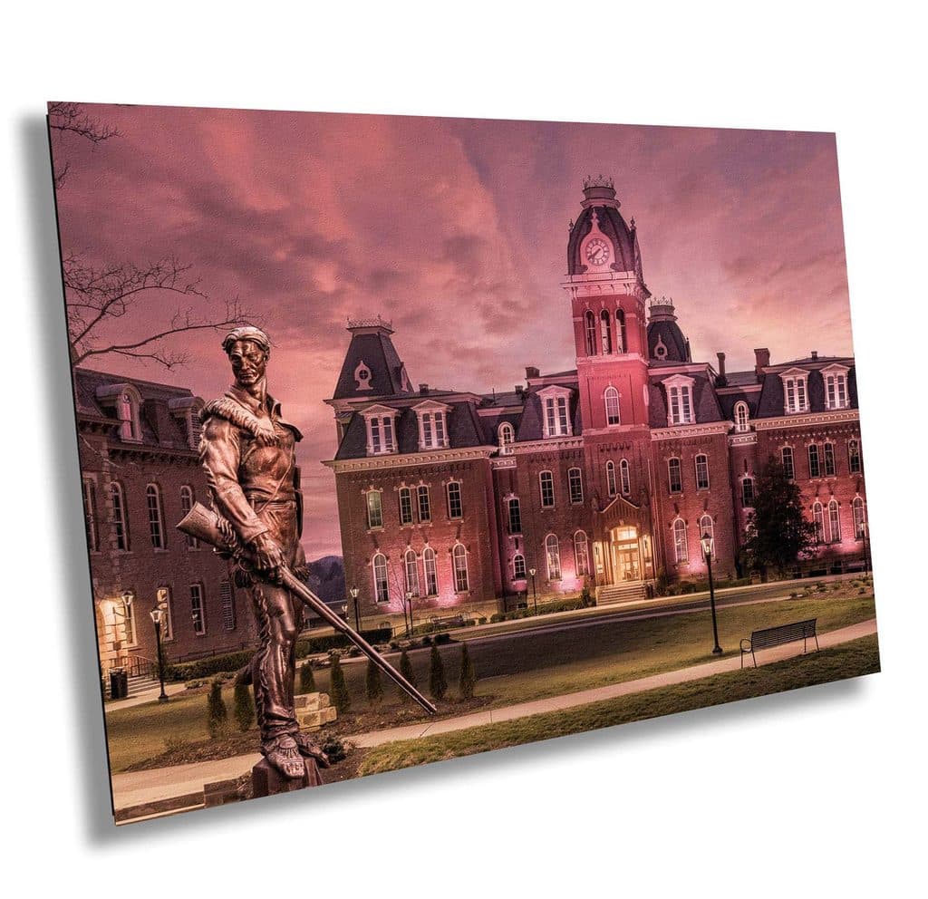 Composite of the Mountaineer Statue against Woodburn Hall at WVU in Morgantown sold as a canvas print